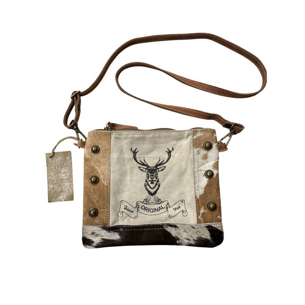 Clea Ray Leather & cow hide